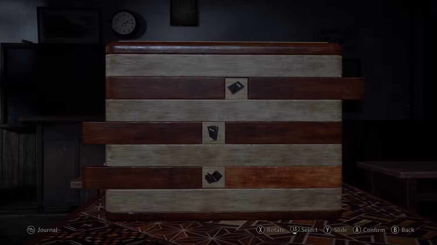 لایه دوم معمای جعبه مخفی با نمادهای دفترچه خاطرات.