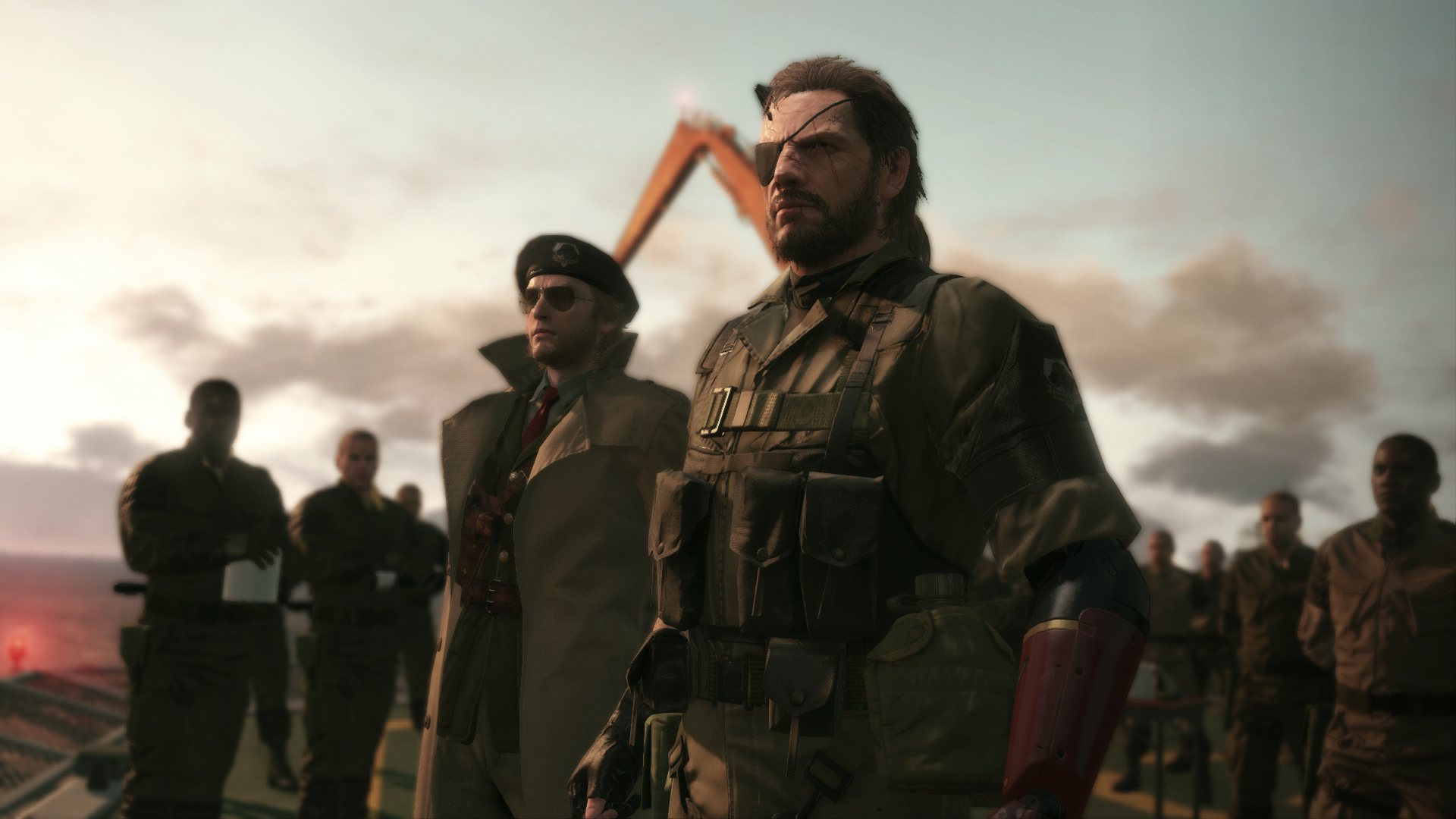 اسنیک به همراه گروهش در نمایی سینمایی از بازی Metal Gear Solid 5، یک شاهکار سندباکس از هیدئو کوجیما.
